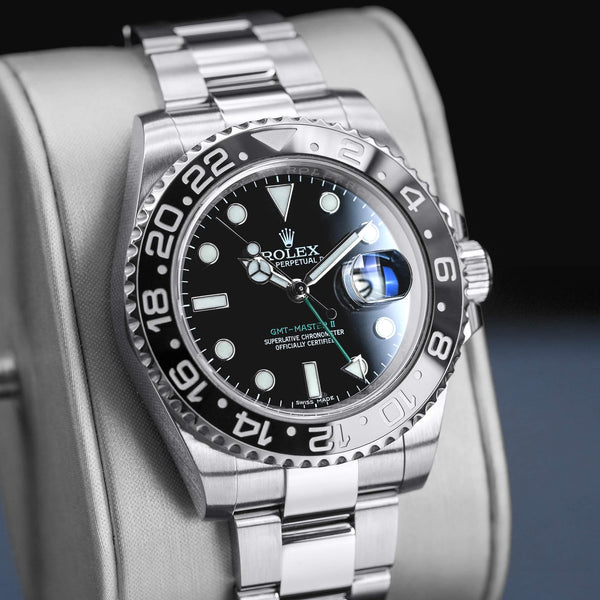 Angled view with reflection of Rolex GMT-Master II 116710LN Green Arrow