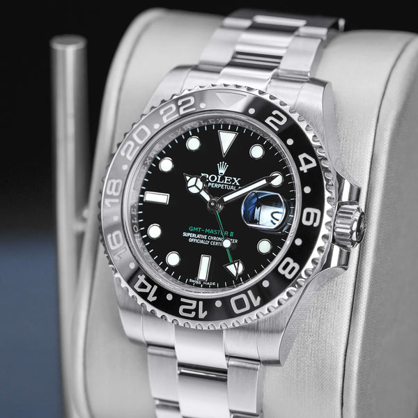 Angled opposing view with reflection of Rolex GMT-Master II 116710LN Green Arrow