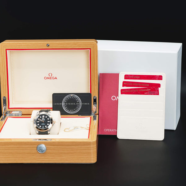 Omega Seamaster Diver 300M Black Dial Sedna Gold with box and papers