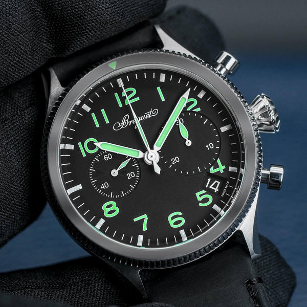 Front view of Breguet Type XX Chronograph 2057ST Black Dial in gloved hand