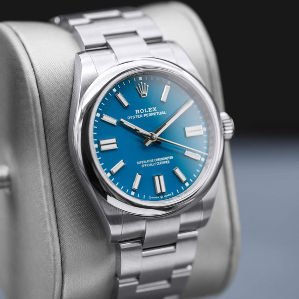 Angled view with reflection of Rolex Oyster Perpetual 134300 Blue Dial