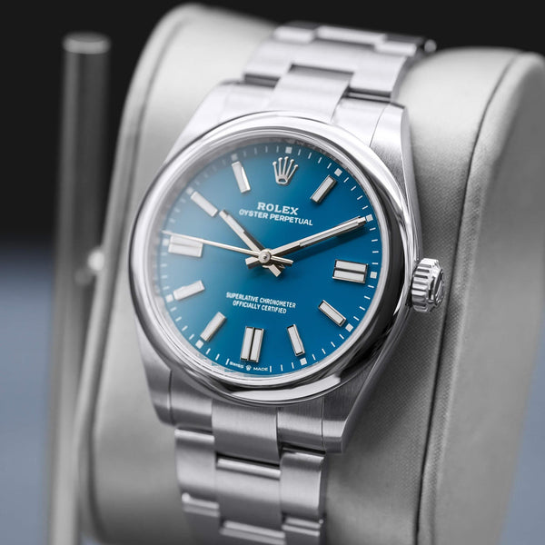 Angled opposing view with reflection of Rolex Oyster Perpetual 134300 Blue Dial