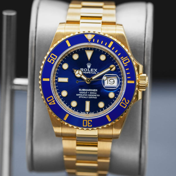 Slight angled view showing crown on Rolex Submariner "Bluesy" 126618LB Yellow Gold