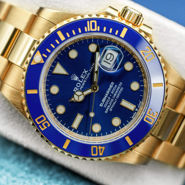 Angled macro view of Rolex Submariner "Bluesy" 126618LB Yellow Gold