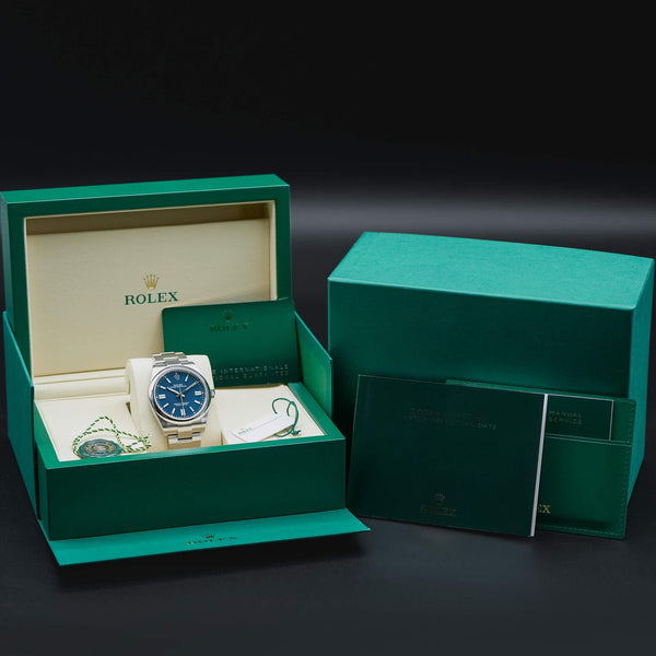 Rolex Oyster Perpetual 134300 Blue Dial with box and papers