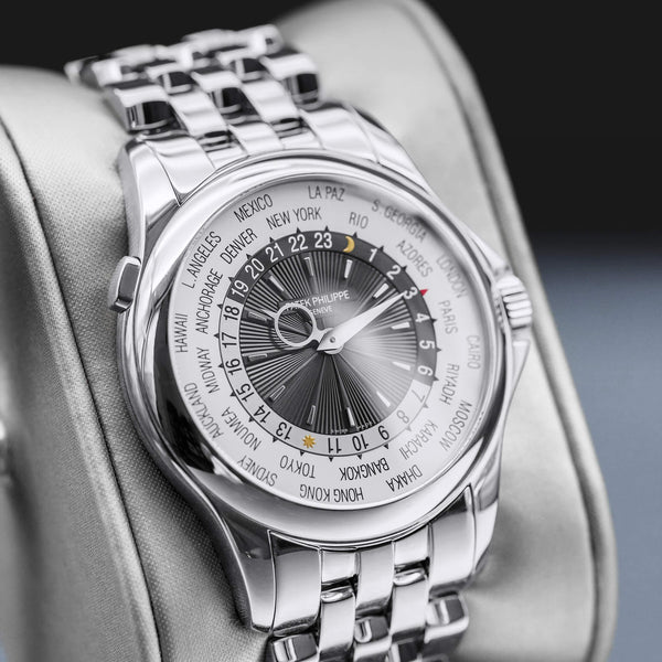 Angled view with reflection of Patek Philippe Complications World Time 5130/1G