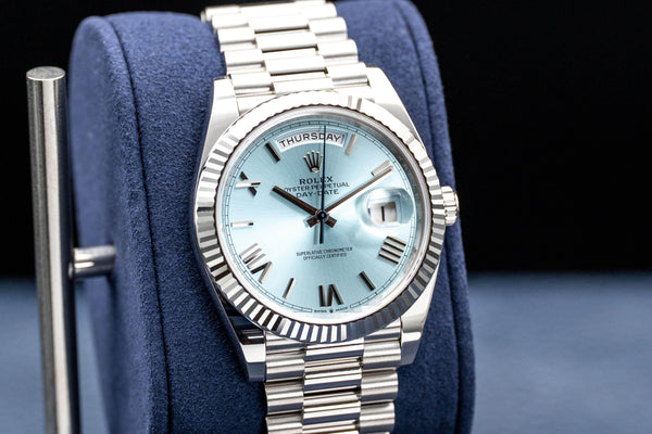 Angled view with reflection of Rolex Day Date 228236 Platinum Blue Dial