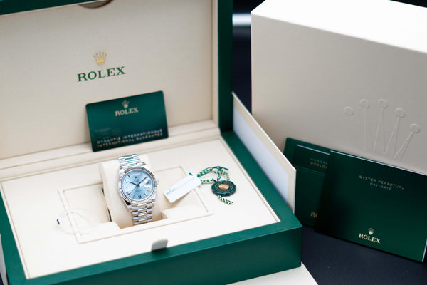 Angled Rolex Day Date 228236 Platinum Blue Dial with box and papers