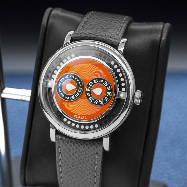 Close up view with crown of MB&F M.A.D 2 Orange Dial