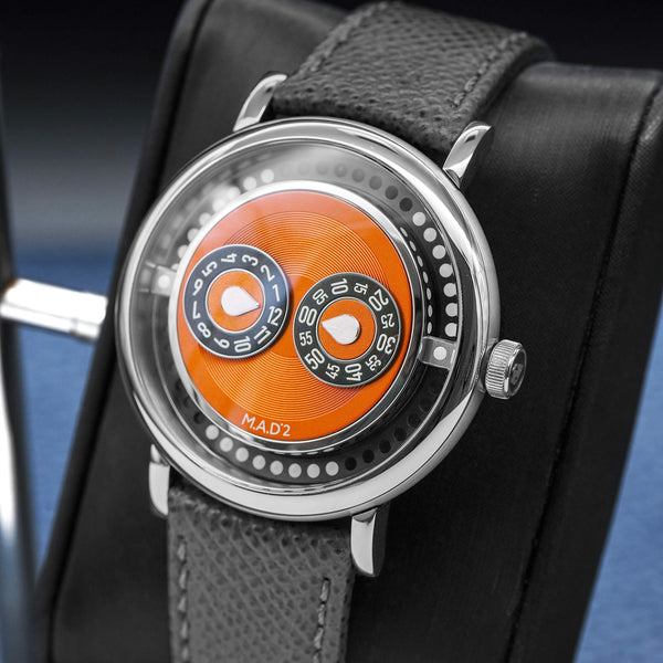 Close-up opposing view of MB&F M.A.D 2 Orange Dial