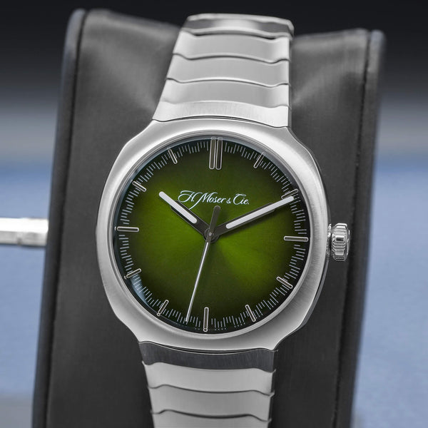 Slight angled view showing crown on H. Moser & Cie Streamliner Centre Seconds Matrix Green 6201-1200