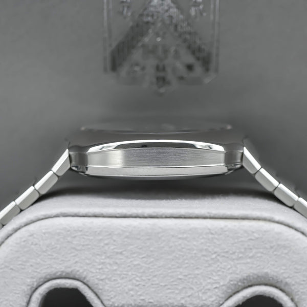 Opposite side view of H. Moser & Cie Streamliner Centre Seconds Matrix Green 6201-1200 case