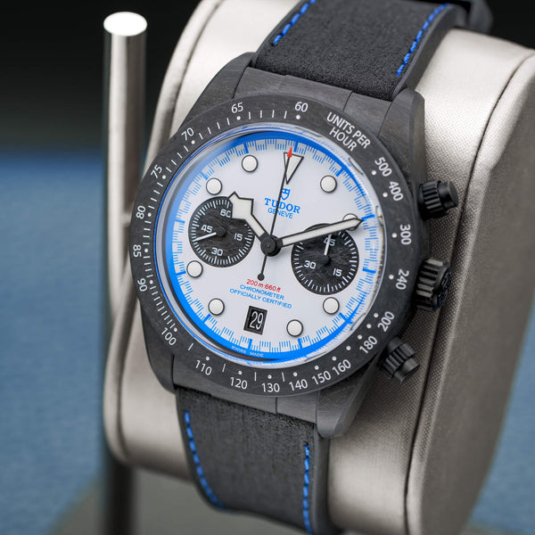 Angled opposing view with reflection of Tudor Black Bay “Carbon 25” M79377KN