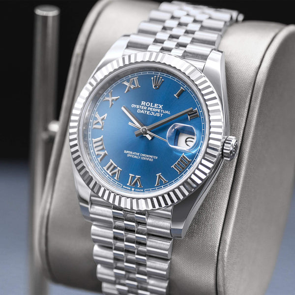 Angled opposing view with reflection of Rolex Datejust 126334 Blue Azurro Dial