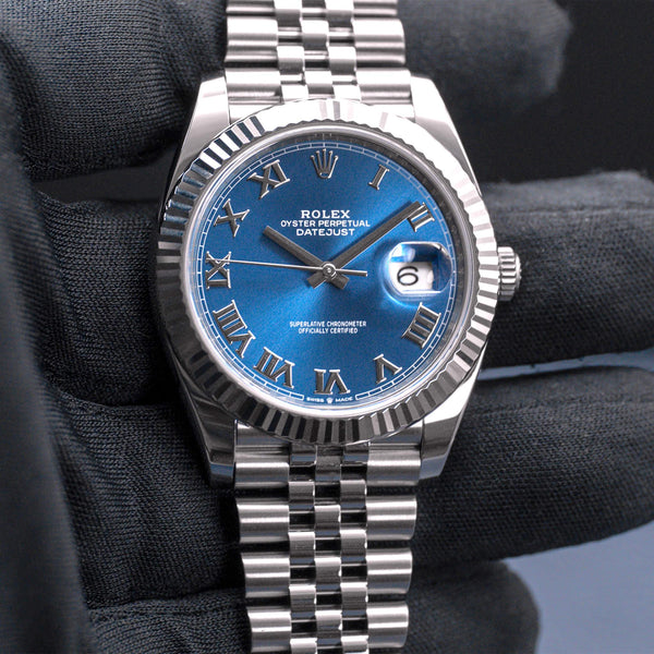 Front view of Rolex Datejust 126334 Blue Azurro Dial in gloved hand