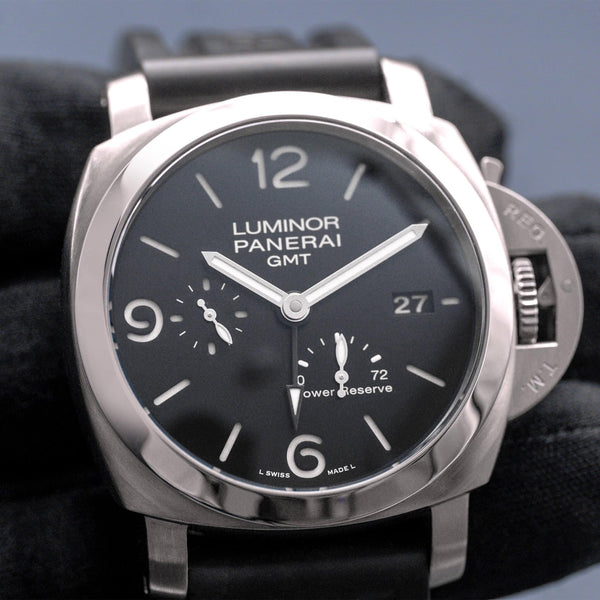 Front view of Panerai Luminor Marina PAM00321 Black Dial in gloved hand