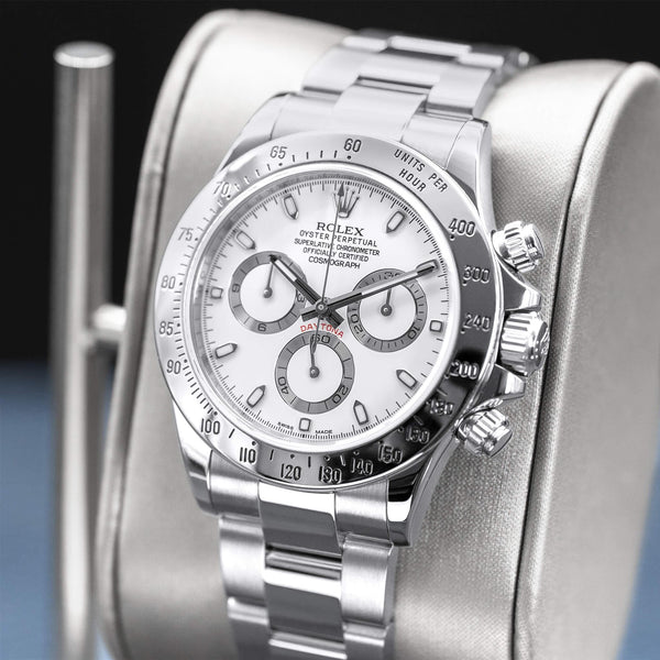 Angled opposing view with reflection of Rolex Cosmograph Daytona 116520 White Dial