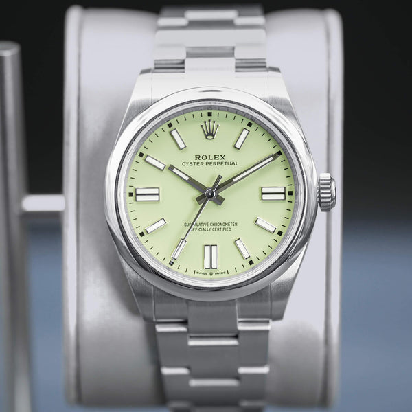 Rolex Oyster Perpetual 134300 Pistachio Dial 41mm Box & Papers