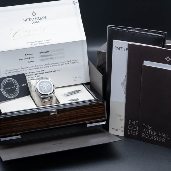 Patek Philippe Nautilus Travel Time 5990/1A with box and papers