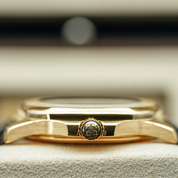 Opposite side view of Patek Philippe Aquanaut 5066J Yellow Gold Black Dial case
