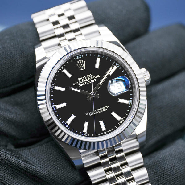 Front view of Rolex Datejust 126334 Black Dial 41mm 2026 gloved hand