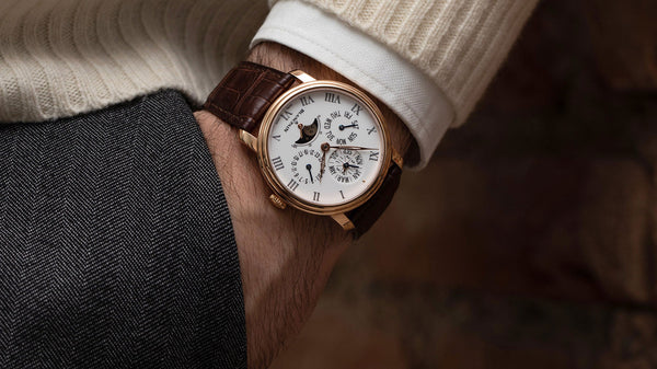 Blancpain Villeret Perpetual Calendar in rose gold with white dial and leather strap on wrist