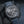 Front view of Ulysse Nardin Freak X Carbon 2303-270/CARB in gloved hand