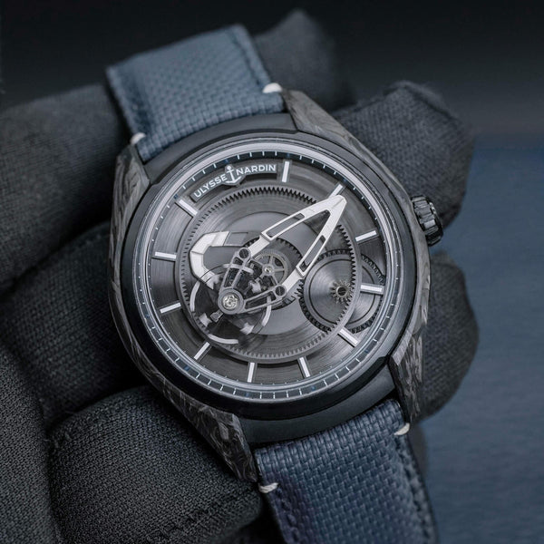 Front view of Ulysse Nardin Freak X Carbon 2303-270/CARB in gloved hand