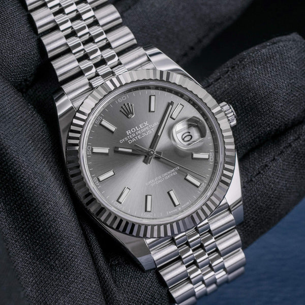 Front view of Rolex Datejust 126334 “Rhodium” Dial in gloved hand