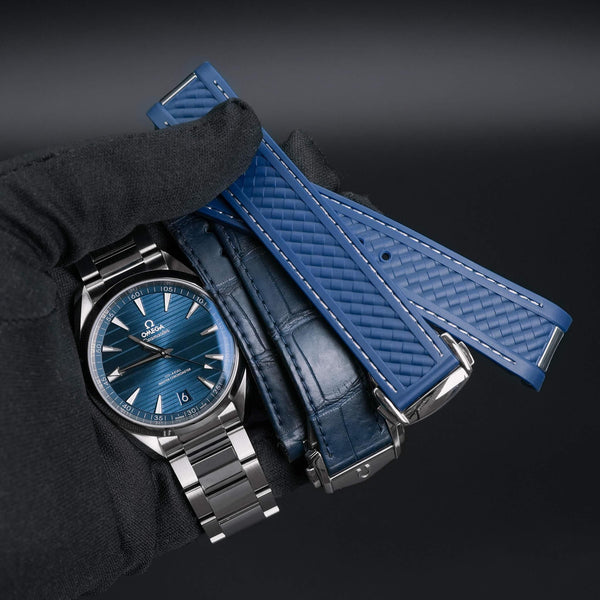Angled view of Omega Seamaster Aqua Terra Blue Teak Dial with all straps