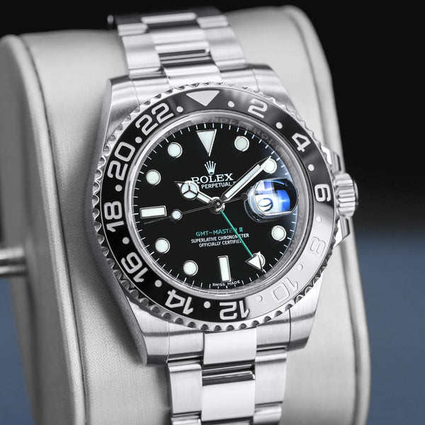 Close-up angled view of Rolex GMT-Master II 116710LN Green Arrow 