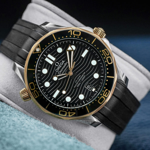Front view of Omega Seamaster Diver 300M Black Dial Sedna Gold 