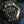 Front view of Omega Seamaster Diver 300M Black Dial Sedna Gold in gloved hand