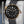 Slight angled view showing crown on Omega Seamaster Diver 300M Black Dial Sedna Gold 