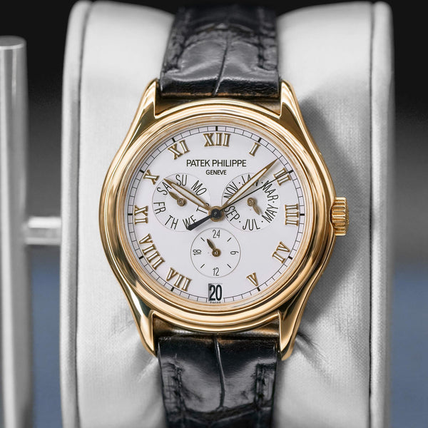 Slight angled view showing crown on Patek Philippe Annual Calendar 5035J Yellow Gold 
