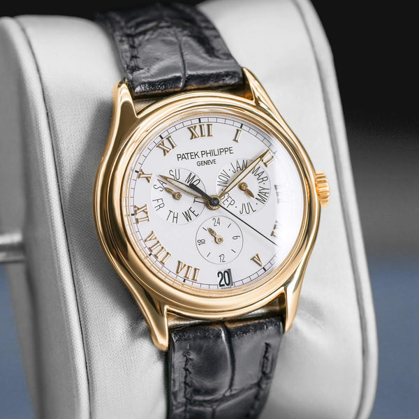 Angled view with reflection of Patek Philippe Annual Calendar 5035J Yellow Gold 