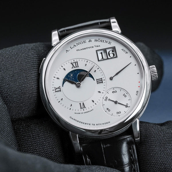 Front view of A. Lange & Sohne Grand Lange 1 139.025 Platinum in gloved hand