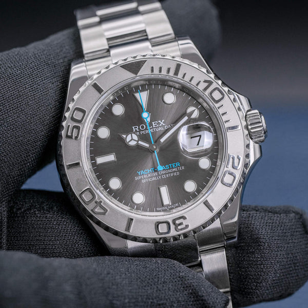 Front view of Rolex Yacht-Master 116622 Rhodium Dial in gloved hand