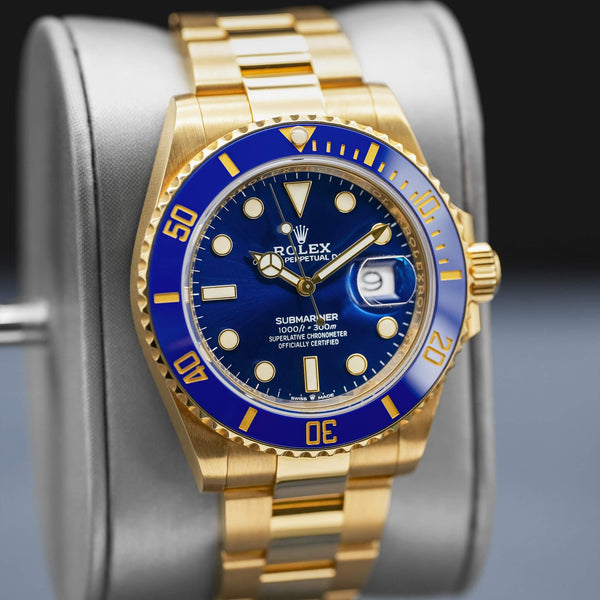 Close-up angled view of Rolex Submariner "Bluesy" 126618LB Yellow Gold 