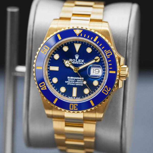 Close-up opposing view of Rolex Submariner "Bluesy" 126618LB Yellow Gold 