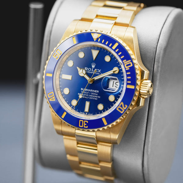 Angled opposing view with reflection of Rolex Submariner "Bluesy" 126618LB Yellow Gold
