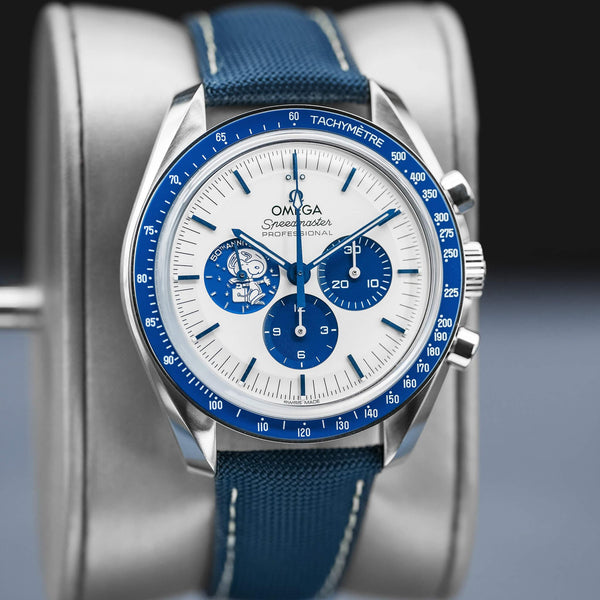 Close-up angled view of Omega Speedmaster “Silver Snoopy Award” 50th Anniversary 2022