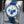 Slight angled view showing crown on Omega Speedmaster “Silver Snoopy Award” 50th Anniversary 
