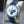 Angled opposing view with reflection of Omega Speedmaster “Silver Snoopy Award” 50th Anniversary 2022