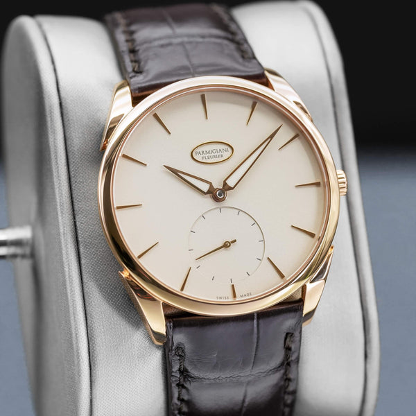 Close-up angled view of Parmigiani Fleurier Tonda 1950 Rose Gold White Dial
