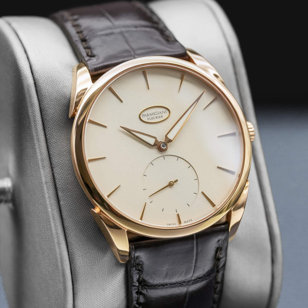 Angled view with reflection of Parmigiani Fleurier Tonda 1950 Rose Gold White Dial 