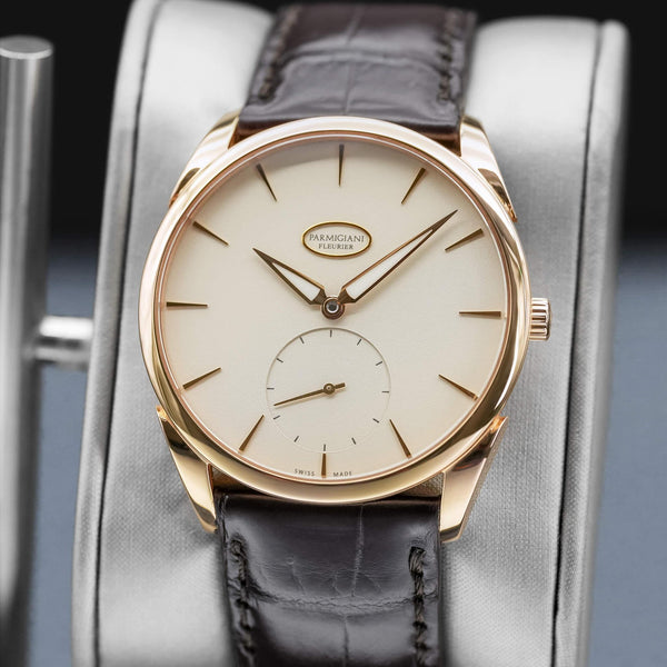 Slight angled view showing crown on Parmigiani Fleurier Tonda 1950 Rose Gold White Dial
