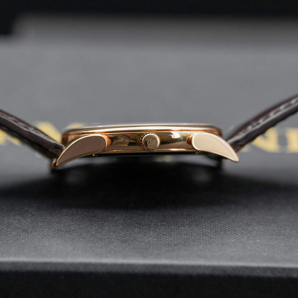 Side profile of Parmigiani Fleurier Tonda 1950 Rose Gold White Dial 