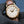 Front view of Patek Philippe Calatrava 5227J Ivory Dial in gloved hand