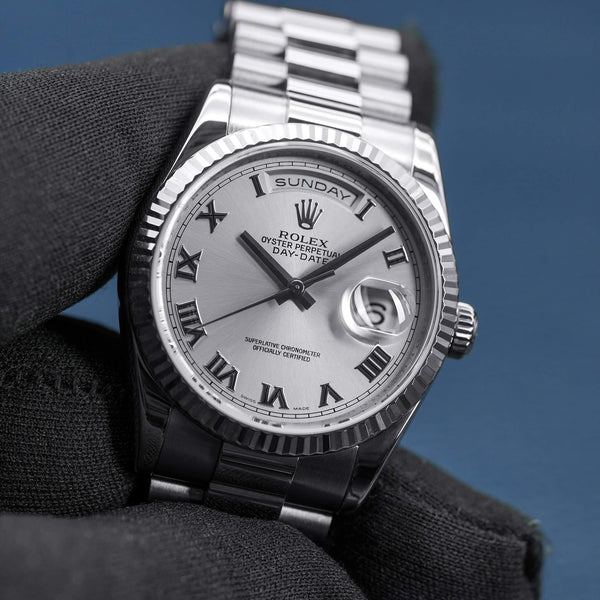 Front view of Rolex Day-Date 118239 Silver Dial in gloved hand